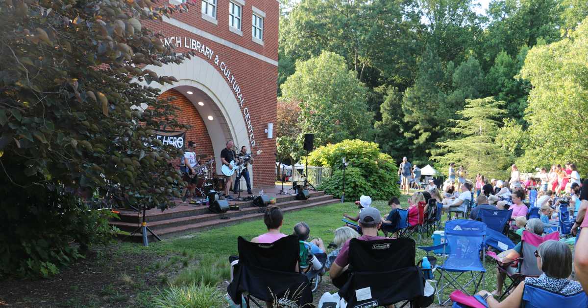 People enjoying an outdoor concert