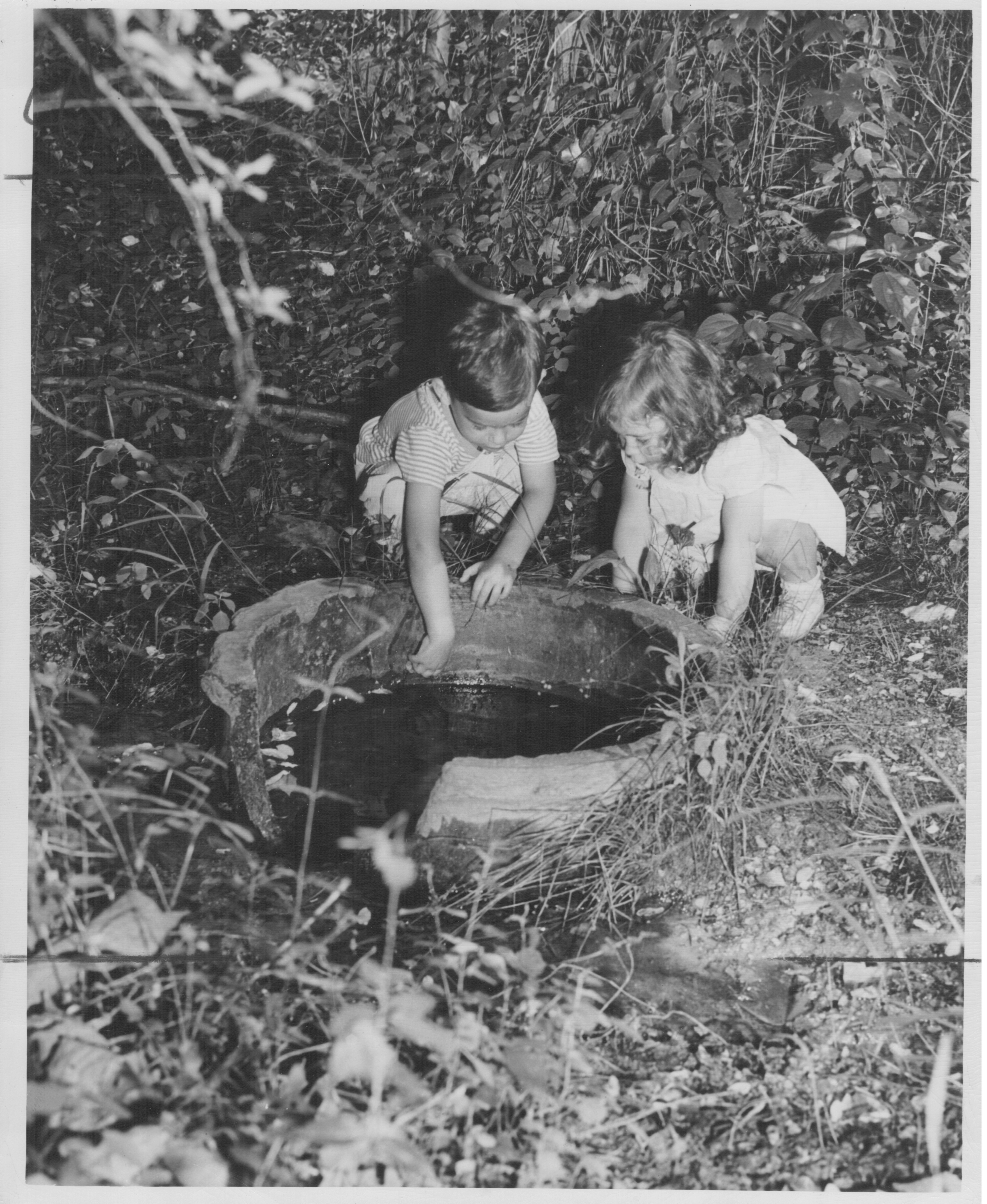 150 Stories: Town Name Origins kids at well